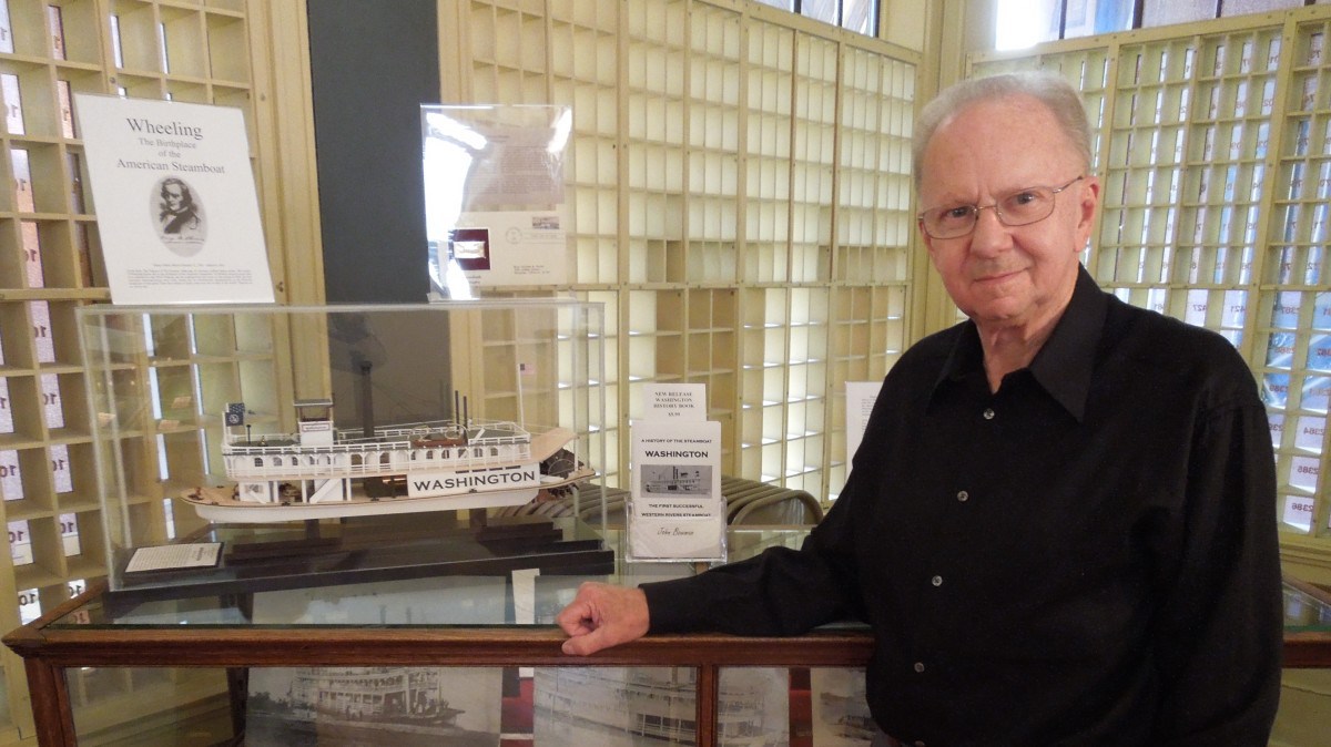 John Bowman and a replica of the Steamboat Washington. Built by Mr.  Bowman, the replica now resides at West Virginia Independence Hall in Wheeling, WV.