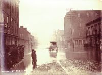 The flood of 1884 showing Market Street at 14th. The Pollock Flour Mill, the four story building in the center, stands on the present day sight of the Central Union building.