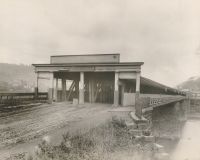 The old wooden covered bridge that crossed the back river was started by Noah Zane in 1833 but he did not live to see it completed four years later.