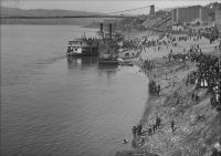 River front tragedy. A yacht capsized and three persons drowned. This interesting picture shows the water front to 3rd Street, and the industry in this section.