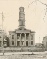 The First Presbyterian Church located between 12th and 14th on Chapline Street. It was built in 1825 and still stands although the steeple has been removed.