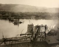 The terminal railroad bridge in North Wheeling was started in 1889. In August, 1891, the first Wheeling and Lake Erie train crossed the bridge and entered the city.