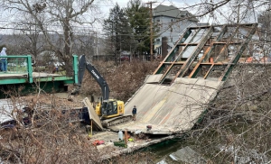 As if to prove its obsolecence, the bridge collapsed shortly after demo began in January 2026. Courtesy Wheeling Fire Dept.