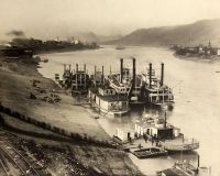 A busy day at the Wheeling Wharf. Scenes like this were daily occurrencenes in the days when the river was the fastest means of transportation between distant cities.