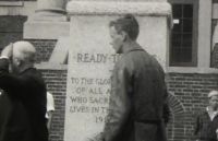 Still from film of Charles Lindbergh's visit to the Louis Bennett, Jr. Aviator monument on the Linsly campus on August 4th, 1927. Wemple Films collection at the Ohio County Public Library Archives.