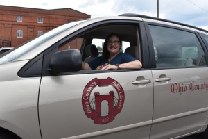 Outreach Services Specialist in library van. Photo by Eric Ayers