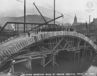 W.C. Brown Photo #76: Placing the keystone at Main Street Bridge