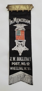 Holliday Post mourning badge. Courtesy Jon-Erik Gilot.