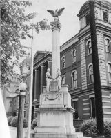 Augustus Pollack monument at its original location on 16th Street near the old city building, 1949. OCPL Archives.