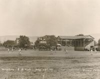 Baseball game in progress in the old ball park on Wheeling Island. Lima, Ohio 7, Wheeling 1, at the end of the seventh inning, in the days when the umpire wore a derby.