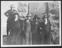 A group of young women and a young gentleman pose in front of  the McColloch's Leap Monument in 1920.   From Ohio County Public Library's Special Collections and Archives, Elizabeth K. Wingerter Collection