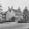 BROWN PHOTO #5: This old tavern was built by Samuel Carter and later sold to G.W. Stamm, grandfather of Mrs. O.W. Burdats. It stood opposite Wheeling Park on National Road. Many famous people stopped at this tavern, including Martin Van Buren in 1848.