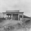 BROWN PHOTO #17: The old wooden covered bridge that crossed the back river was started by Noah Zane in 1833 but he did live to see it completed four years later.